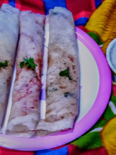 A picture of Dosa(onion, tomato and egg).