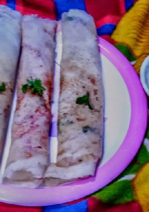 A picture of Dosa(onion, tomato and egg).