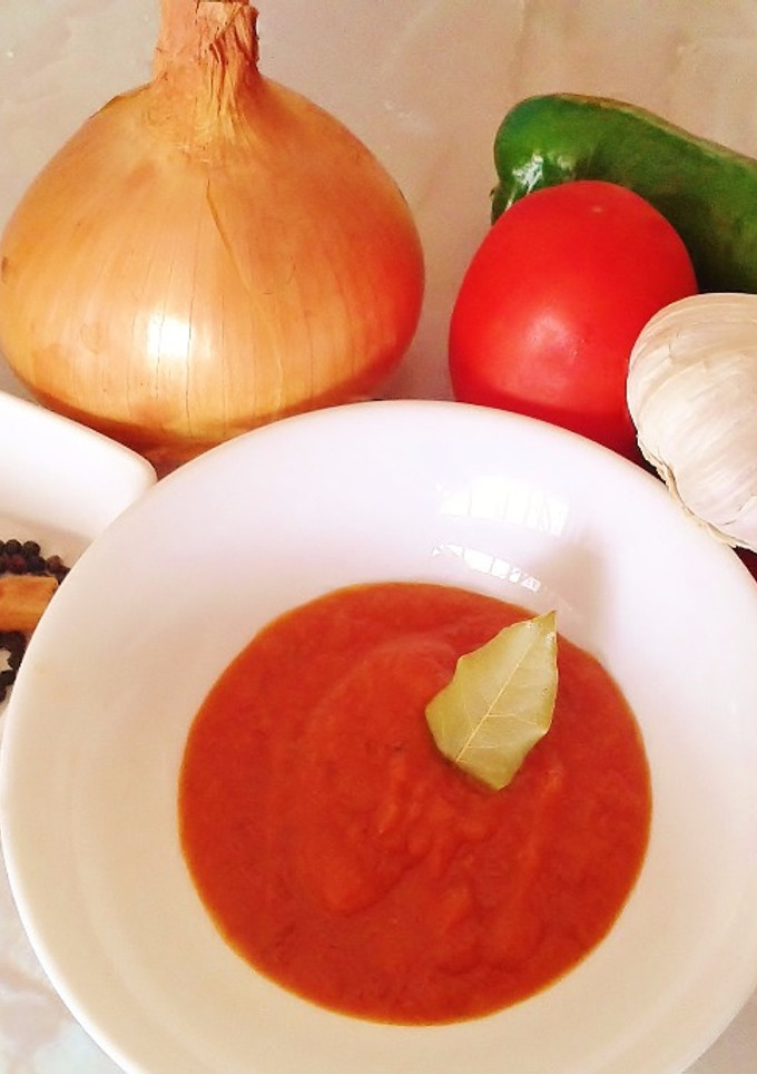 Una foto de Sofrito de cebolla, tomates y pimientos