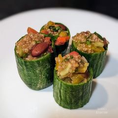 Mexican quinoa salsa in cucumber pockets A picture of Mexican quinoa salsa in cucumber pockets.