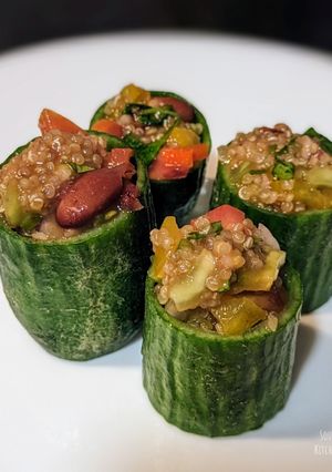 A picture of Mexican quinoa salsa in cucumber pockets.