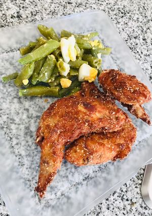 Una foto de Alitas de pollo rebozada y fritas