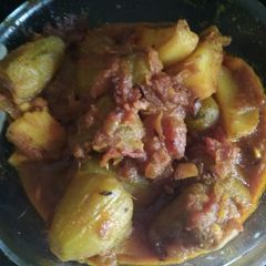 Aaloo potoler dalna (potato pointed gourd curry) A picture of Aaloo potoler dalna (potato pointed gourd curry).