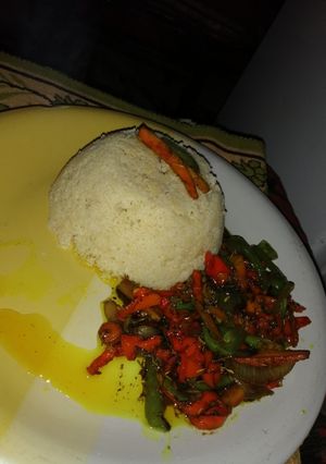 A picture of Couscous with stirfry veggie sauce (vegan).