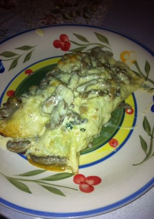Una foto de Canelones de pollo y espinaca