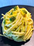 Spaghetti con crema di broccoli e grana padano