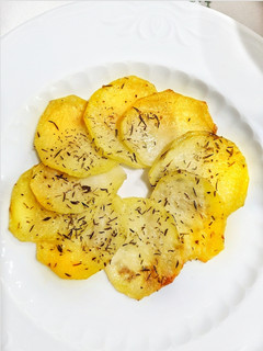 Una foto de Patatas asadas con romero y tomillo