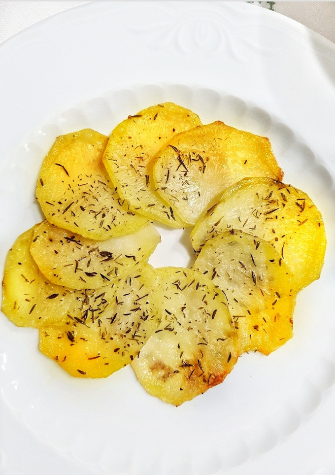 Una foto de Patatas asadas con romero y tomillo