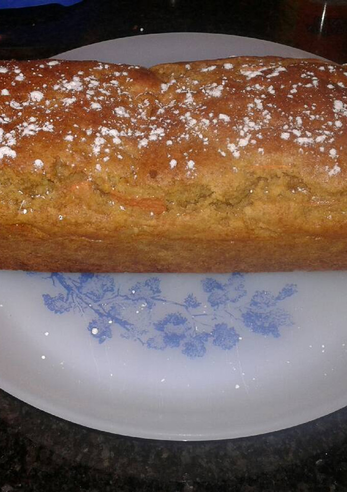 Una foto de Bizcocho de zanahorias y almendra picada
