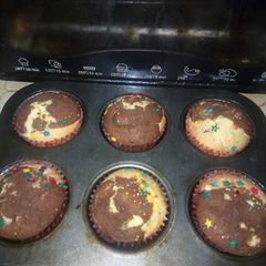 A picture of Yummy Cup Cakes with Sprinkles.