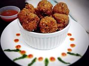 A picture of red chilli powder sesame seeds
