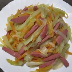 A picture of Sauteed Carrots and Melon.