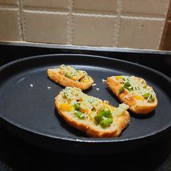 A picture of Garlic bread bruschetta.