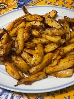 Une photo de Potatoes sauce barbecue origan