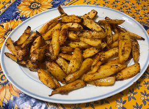Une photo de Potatoes sauce barbecue origan