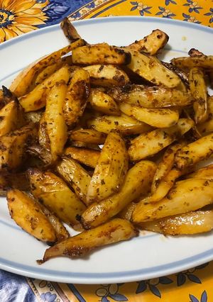 Une photo de Potatoes sauce barbecue origan