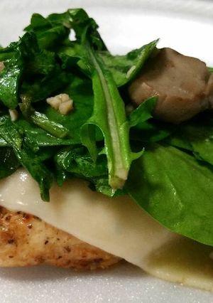 A picture of Mushroom Garlic Chicken with Arugula.