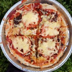 A picture of Quick pizza recipe with left over bread dough.