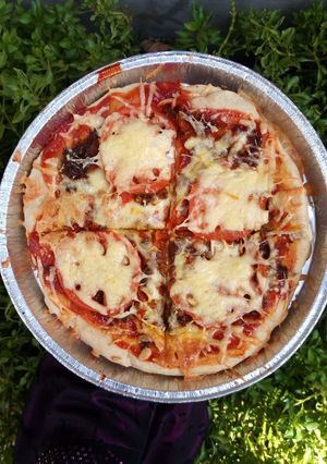 A picture of Quick pizza recipe with left over bread dough.