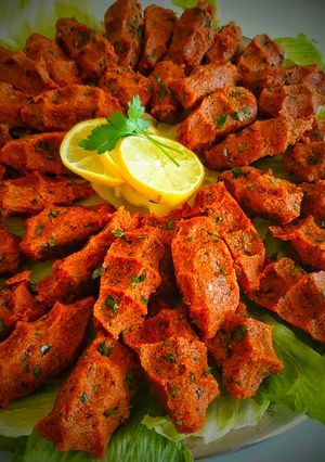 A picture of Kibbeh Nayyeh with Pomegranate Molasses and Lemon Juice 🍋🍋.