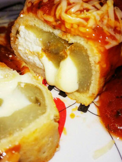 Una foto de Canelones de berenjena, ricota y queso