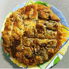 A picture of Pull apart garlic bread.
