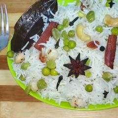 A picture of Dry fruits and matar pulao.