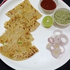 A picture of Gobhi paneer cheese paratha.