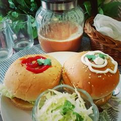 A picture of Chicken Burger with Tea.