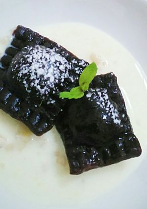 A picture of Chocolate Ravioli with Khoya Filling.