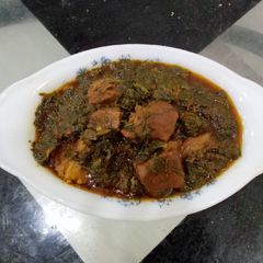 A picture of Butter oxtail spinach.