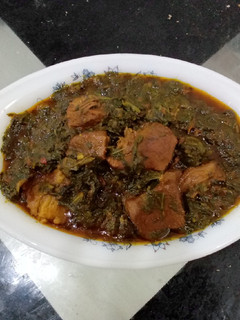 A picture of Butter oxtail spinach.