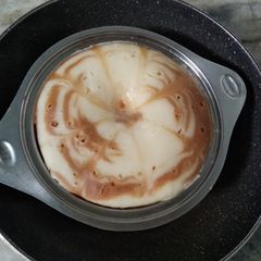 A picture of Cake in wok.