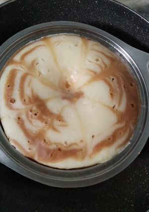 A picture of Cake in wok.