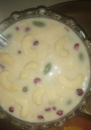A picture of Mix fruit and dryfruit custard.