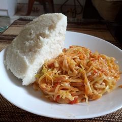 A picture of Ugali and spiced cabbage.