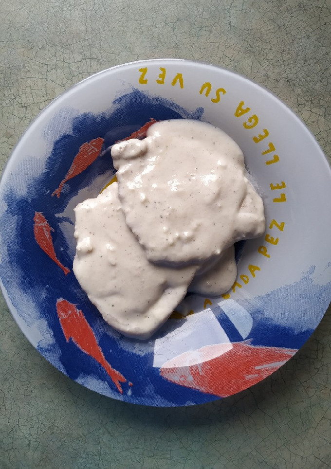 Una foto de Lomo al ajillo con nata