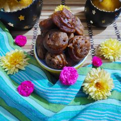 A picture of Mini Whole Wheat Palm Jaggery Appams.