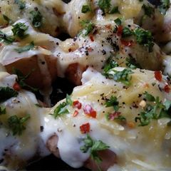 A picture of Baked Rosemary Cheesy Potatoes.