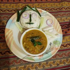A picture of Samber Chawal with salad.