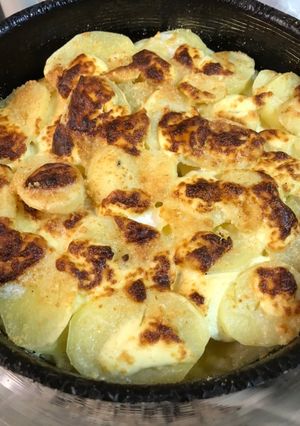 Una foto de Papas a la crema y queso