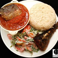 A picture of Rice, stew, fish and salad.