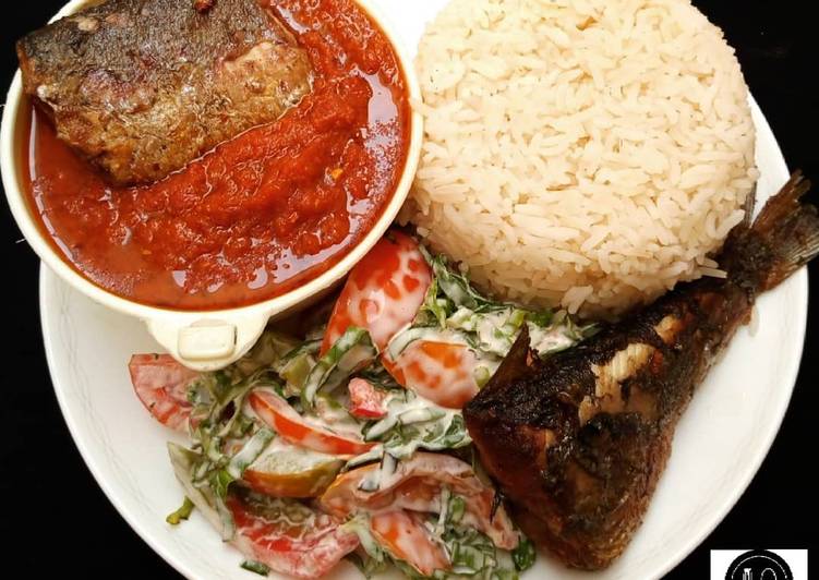 Rice, stew, fish and salad