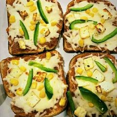 Paneer cheese pizza A picture of Paneer cheese pizza.