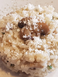 Una foto de Arroz con boletus