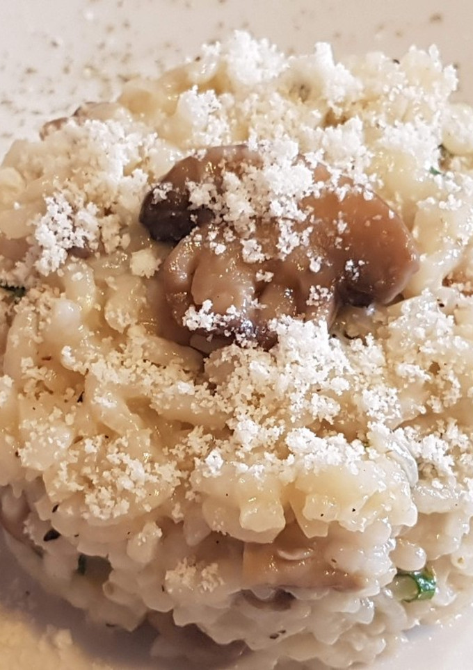 Una foto de Arroz con boletus