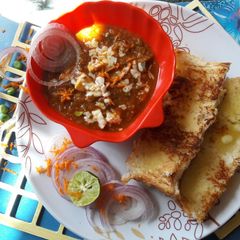 A picture of Paneer cheese pav bhaji.