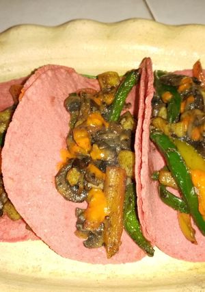 Una foto de Tacos de papa con champiñón