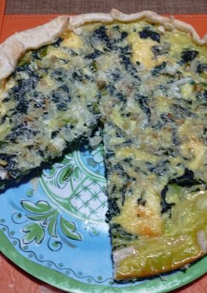 Una foto de Tarta light de tallo y hojas de brócoli con queso y huevo