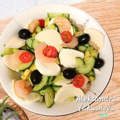 A picture of Cucumber Salad with Avocado, Shrimp and Mozzarella.
